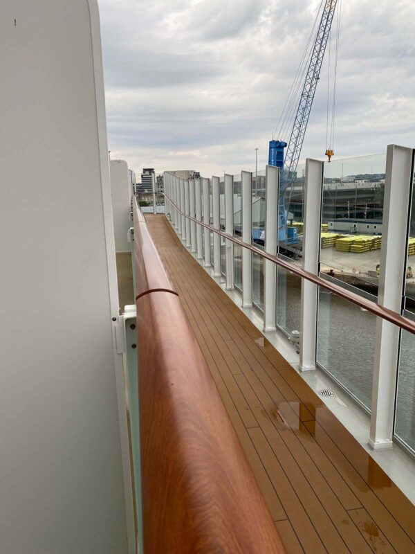image of view along narrow cruise ship promenade deck