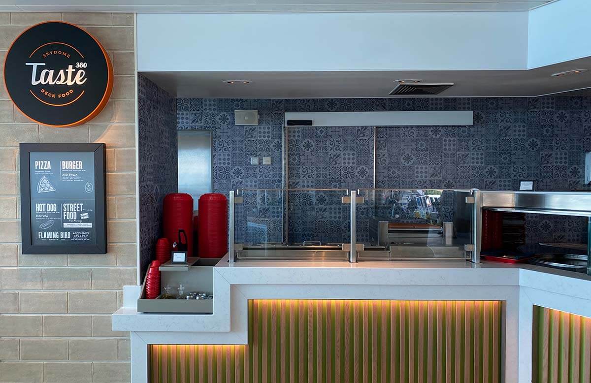 Counter serving pizzas and hot dogs